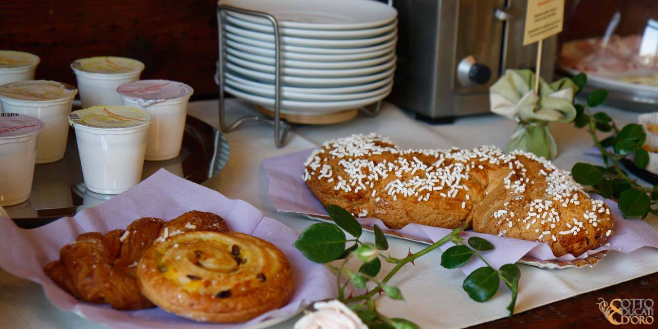 Hotel with classic Italian breakfast with cappuccino and croissant