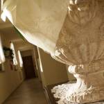 Corridor with rooms on the ground floor of the Otto Ducati d’Oro relais
