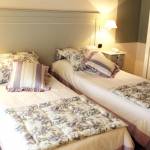 Sleeping in a double room for single occupancy with twin beds available